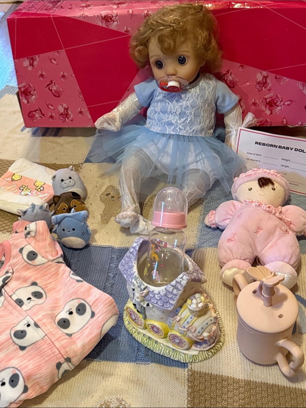NWT..Reborn Blue-Eyed Baby Doll with Curly Hair. Adorable..